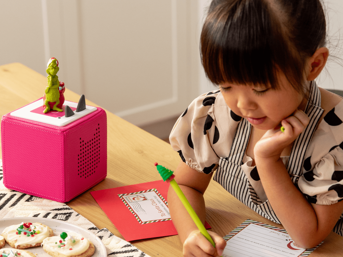 Enfant écoutant le Tonie Grinch