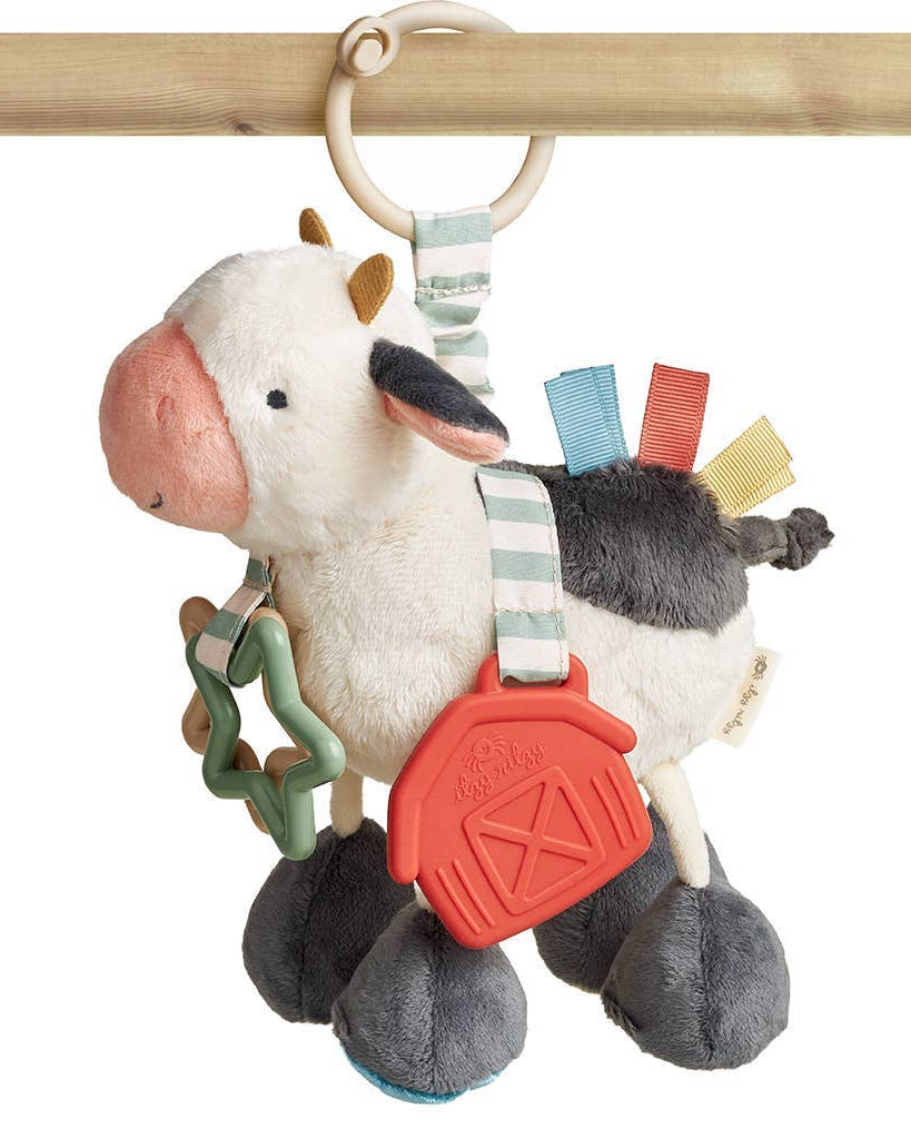 Peluche d’activités sensorielle bébé – Vache Itzy Friends Link & Love™ - Jouets d'éveil - Boutique LeoLudo - Itzy Ritzy Canada