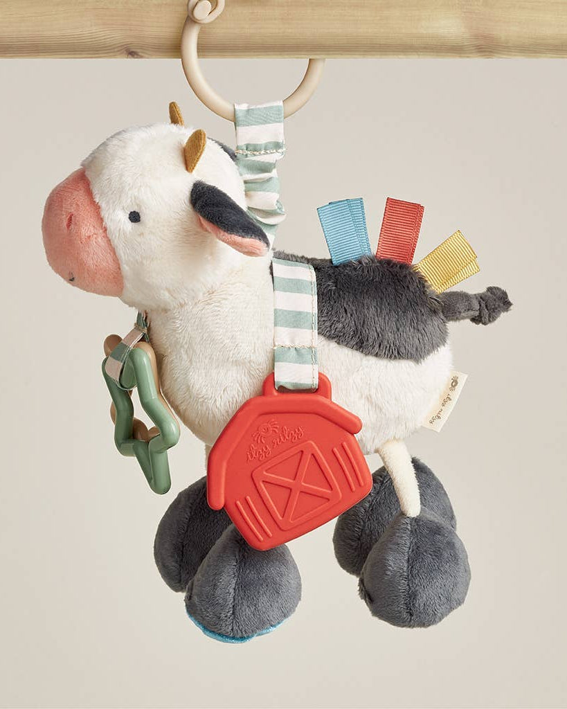Peluche d’activités sensorielle bébé – Vache Itzy Friends Link & Love™ - Jouets d'éveil - Boutique LeoLudo - Itzy Ritzy Canada
