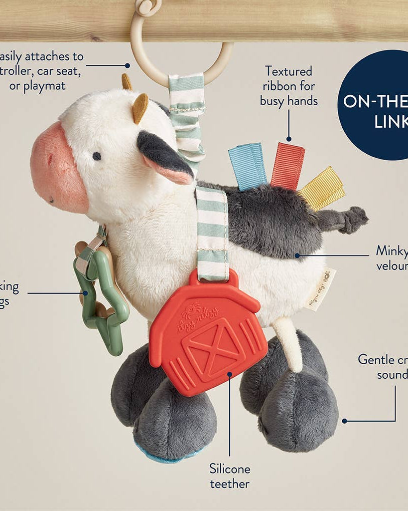 Peluche d’activités sensorielle bébé – Vache Itzy Friends Link & Love™ - Jouets d'éveil - Boutique LeoLudo - Itzy Ritzy Canada