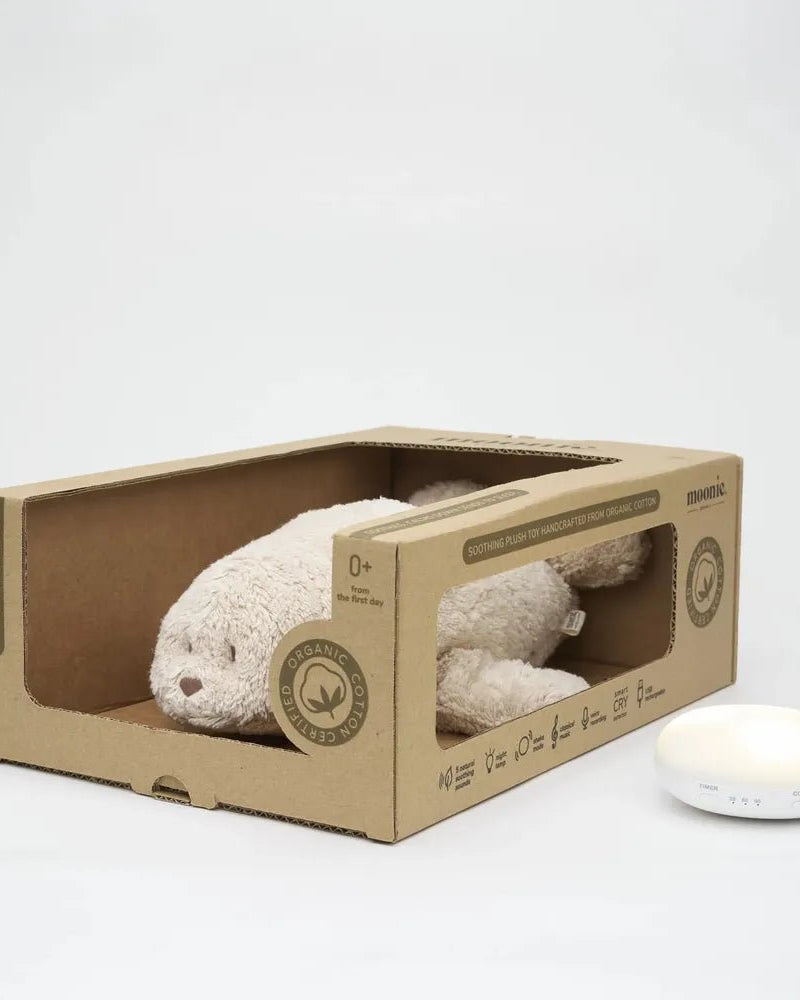 Phoque Moonie sable – Peluche apaisante biologique avec veilleuse - Jouets d'éveil - Boutique LeoLudo - moonie