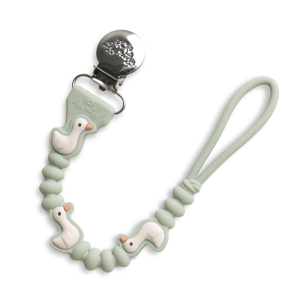 Attache-suce bébé – Itzy Paci Strap Plus™ Oie