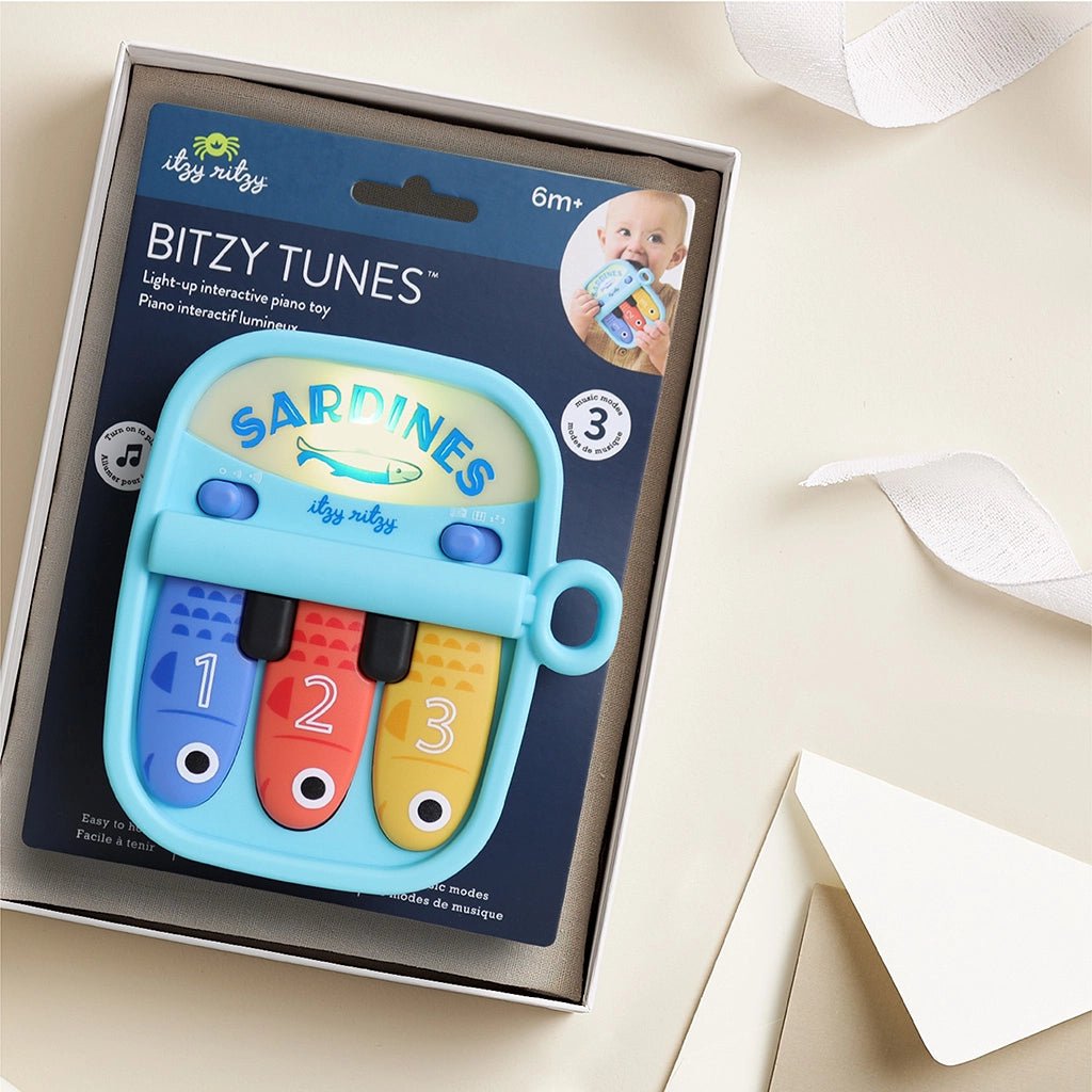 Bitzy Tunes™ – Piano interactif lumineux Sardines -Jouets d'éveil- Boutique LeoLudo-Itzy Ritzy Canada
