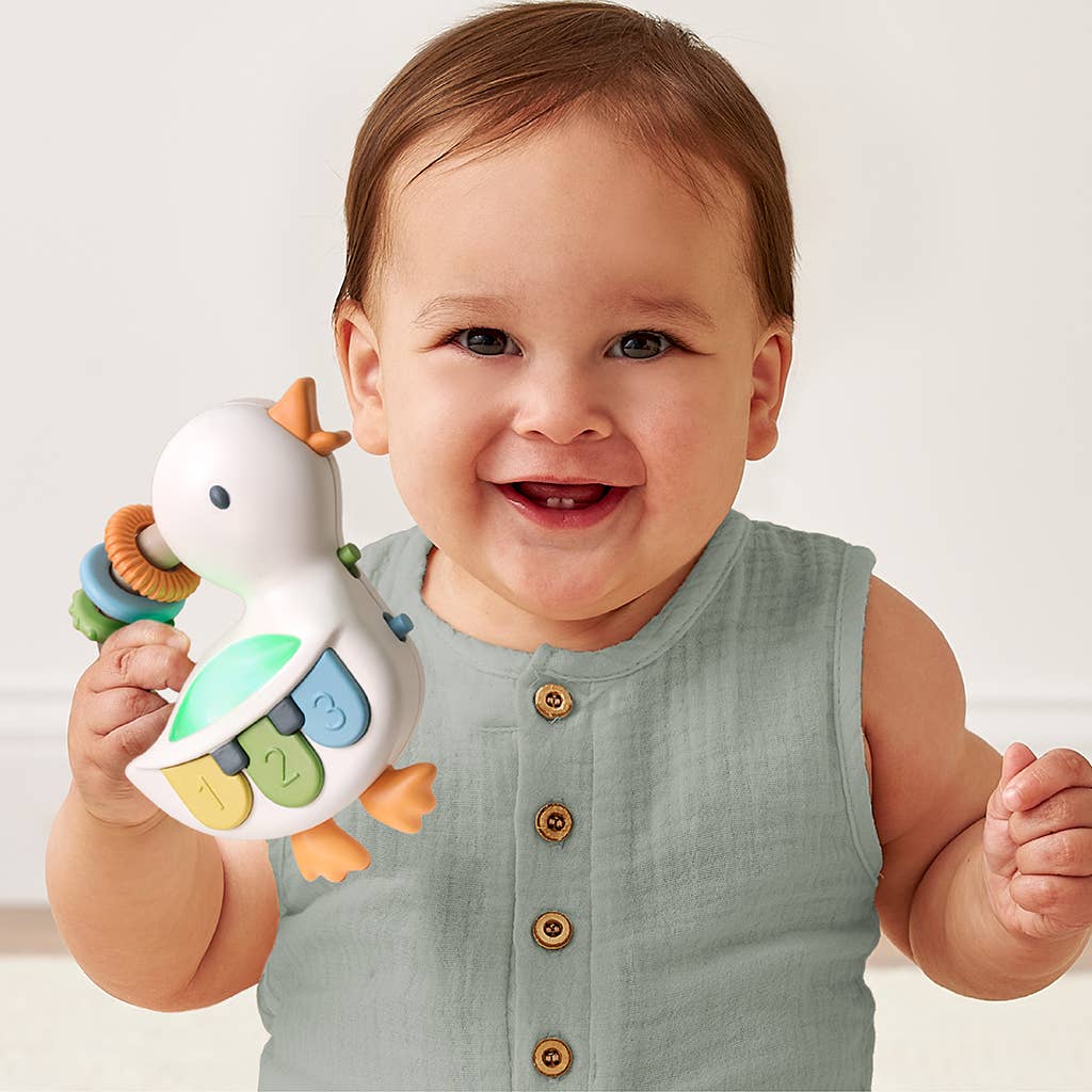 Bitzy Tunes™ – Piano musical interactif lumineux -Jouets d'éveil- Boutique LeoLudo-Itzy Ritzy Canada