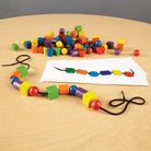 Ensemble d'activités de perles et cartes à motifs (130 pcs) - Jeux de motricité fine - Boutique LeoLudo - Learning Resources