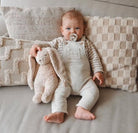 Lapin Rose Moonie – Peluche sonore biologique avec veilleuse - Jouets d'éveil - Boutique LeoLudo - moonie