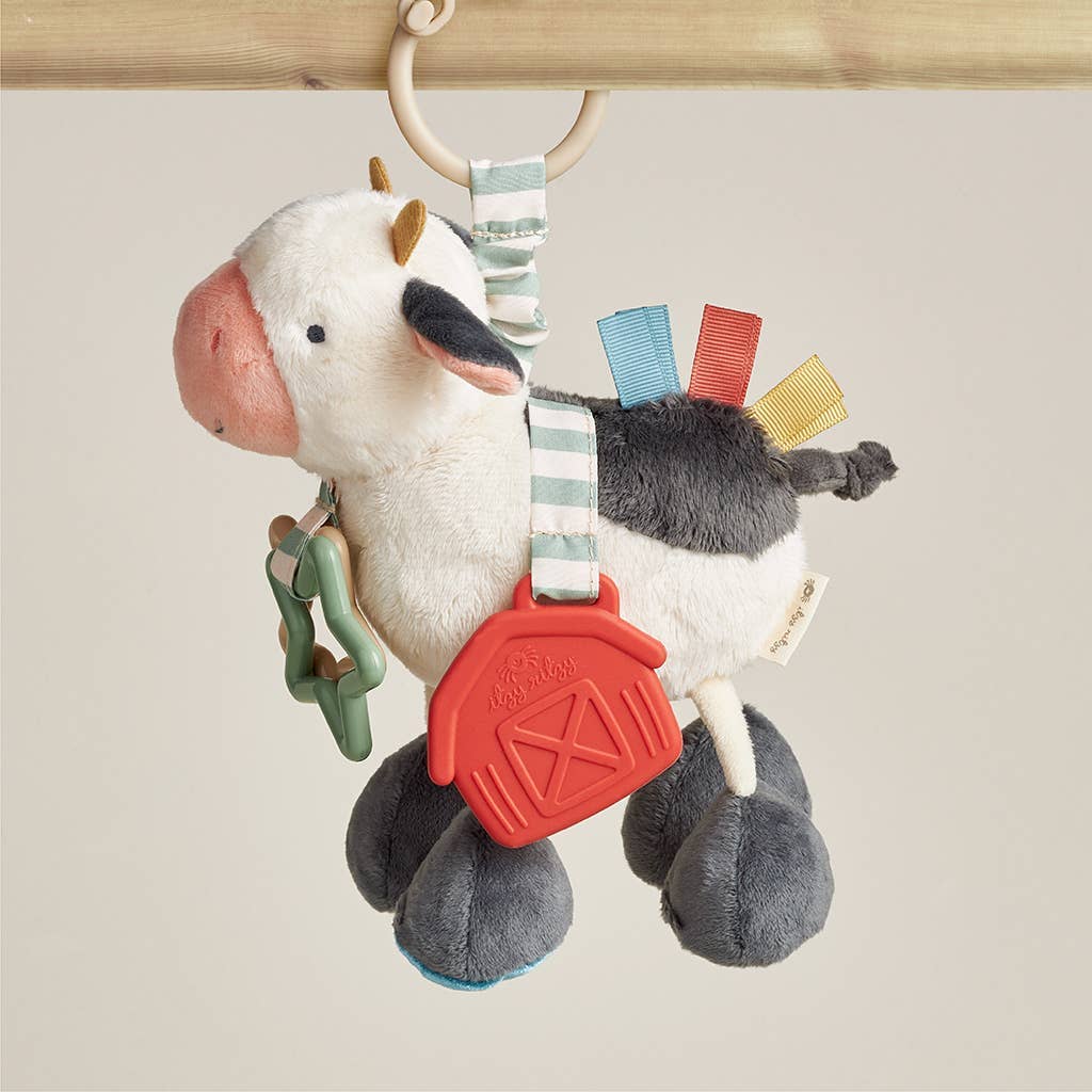 Peluche d’activités sensorielle bébé – Vache Itzy Friends Link & Love™ - Jouets d'éveil - Boutique LeoLudo - Itzy Ritzy Canada