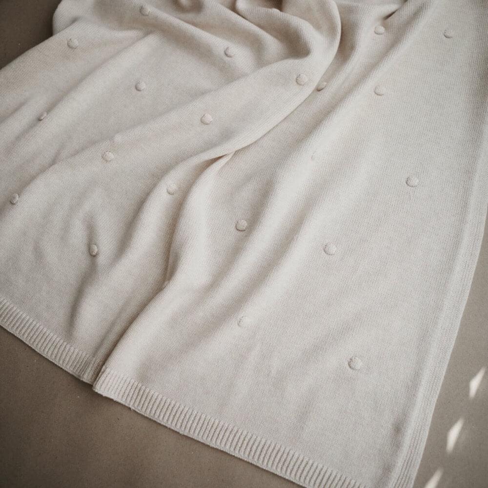 Couverture à pompons en tricot - Blanc cassé-Mushie-Boutique LeoLudo